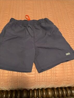 Saxx Navy Blue swim trunks with Orange Drawstring size small